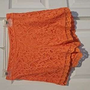 Coral midriff lace detail shorts